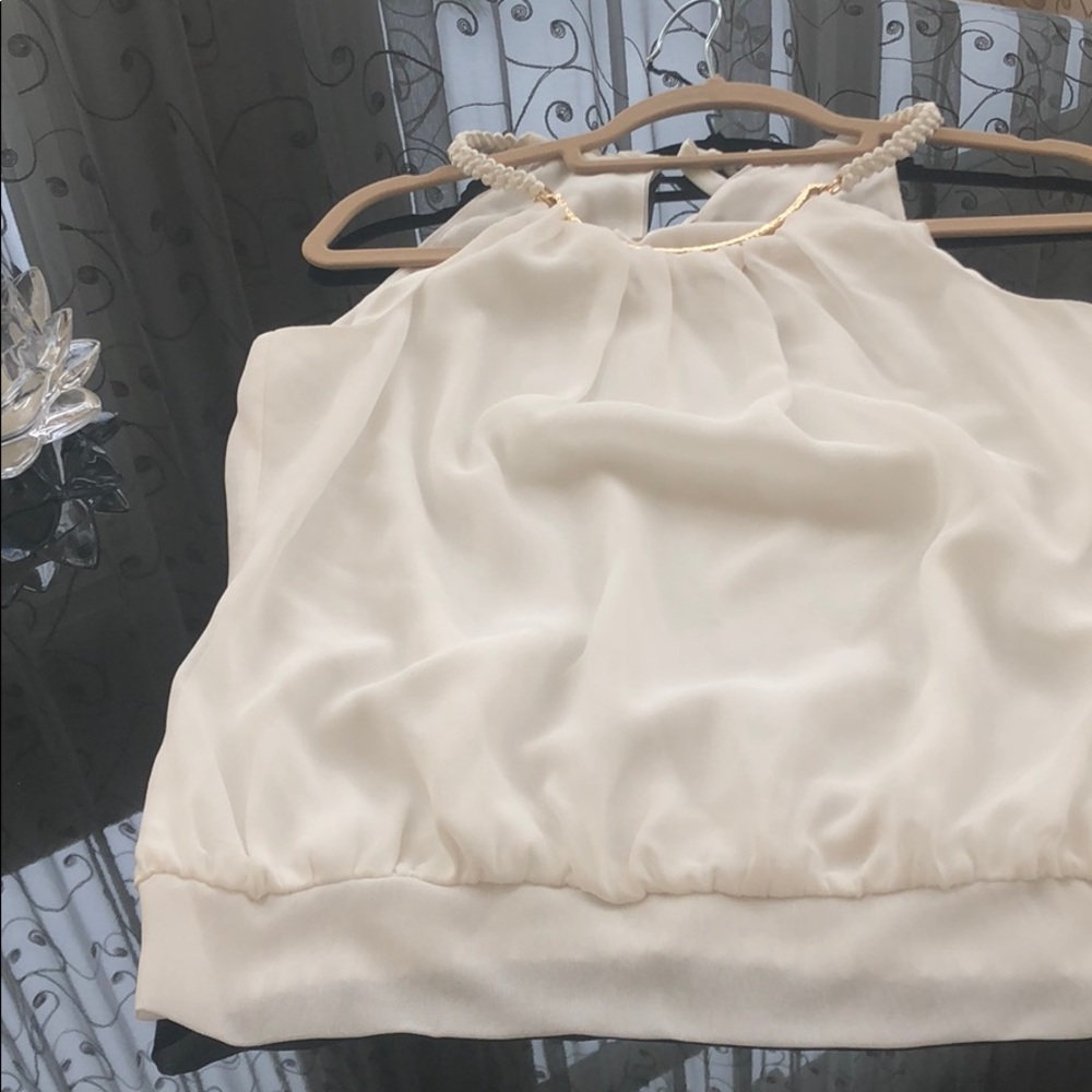 White Cache silk top.